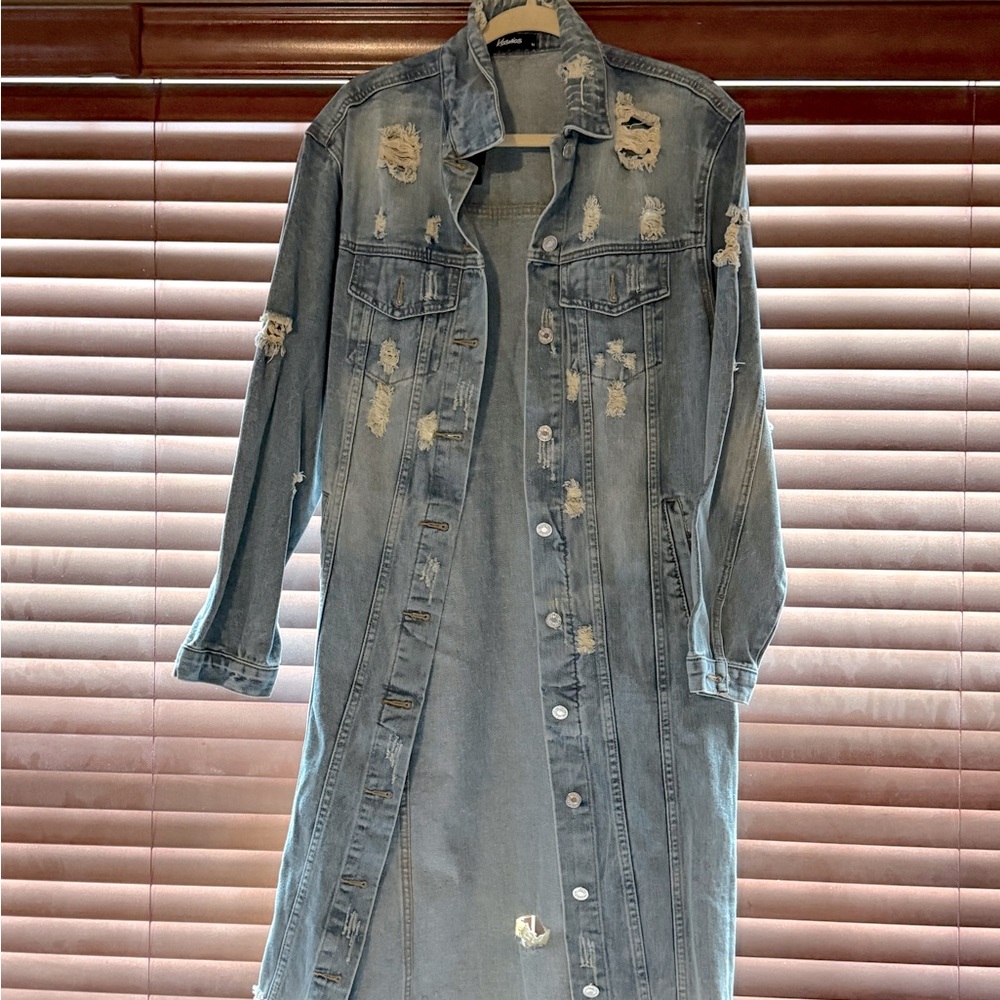 New long denim distressed coat with tag on its size M. Kosmios brand.